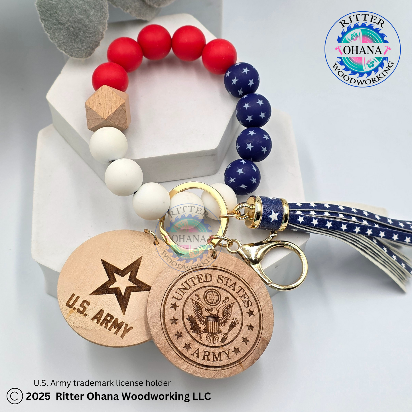silicone red, white and blue with star beaded Bracelet, keychain , tassel in blue with stars like the us flag, with wooden round disk with military logo engraded