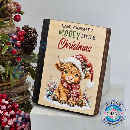 Wooden Christmas money and gift card holder with festive highland cow design, 