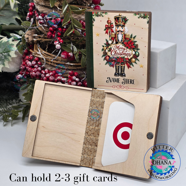 Personalized wooden Christmas gift card holders featuring  nutcracker with custom names on the front, magnetic opening and slot for gift card