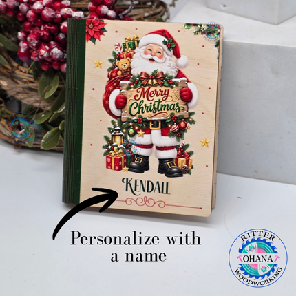 Personalized wooden Christmas gift card holders featuring Santa Claus designs with custom names and festive holiday artwork.