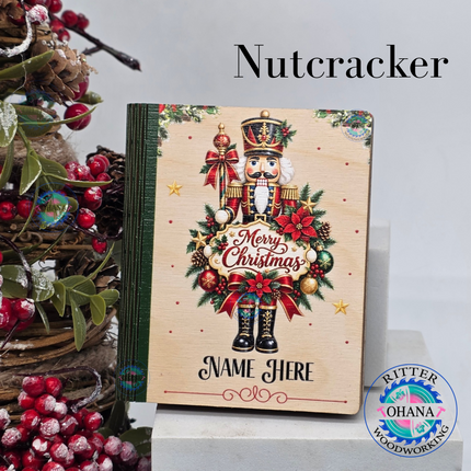 Personalized wooden Christmas gift card holders featuring nutcracker designs with custom names and festive holiday artwork.